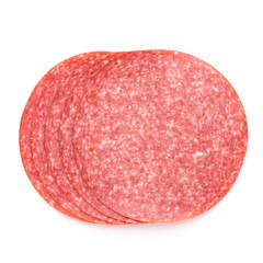Salami slices on white background.