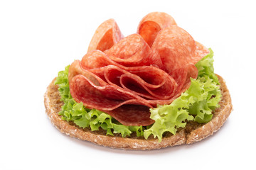 Sandwich with ham sausage on white background.