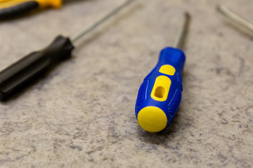 screwdriver yellow blue repair home master fasteners fixation end rubber handle protection