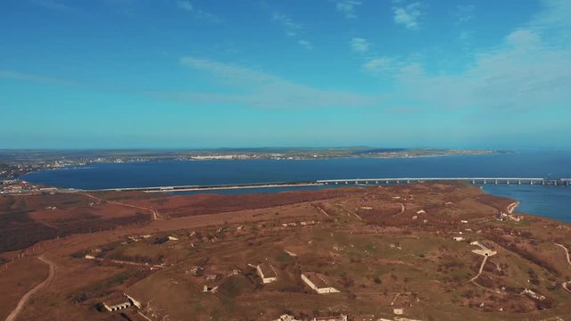 Aerial panoramic view from Kerch penisula to famous Crimean Bridge conncecting Taman and Crimea.