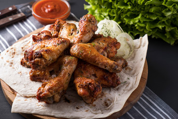 BBQ chicken wings with sauce. Space for text. Copy space