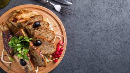 Tasty stuffed chicken with copy space. Delicious stuffed chicken. Top view