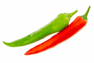 pair of bright juicy hot peppers long peppers peppers red seasoning sauce on a white background