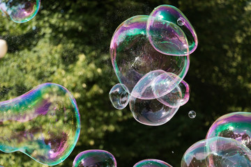 Soap bubbles on the summer street.