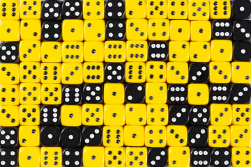 Background patteren of random ordered yellow and black dices