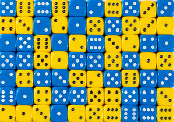 Background of 70 random ordered blue and yellow dices