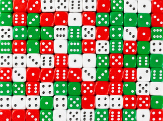 Background pattern of random ordered white, red and green dices