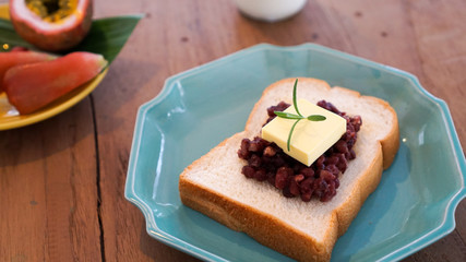 red bean toast with butter. ang butter bread. breakfast table