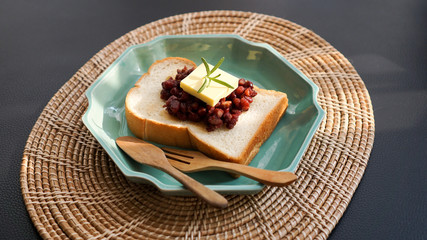 red bean toast with butter. ang butter bread. breakfast table