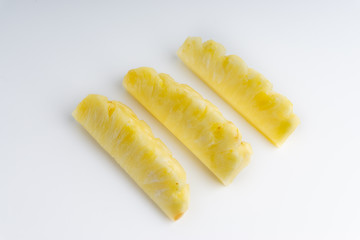 Pineapple with slices isolated on white background. Selective focus