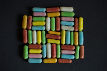 multicolored licorice candy in frosting