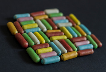 multicolored licorice candy in frosting