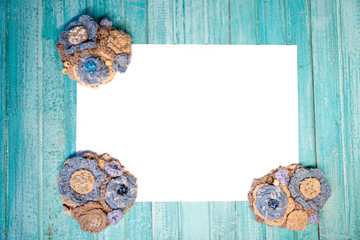 mockup blue fabric brooch with threads on table