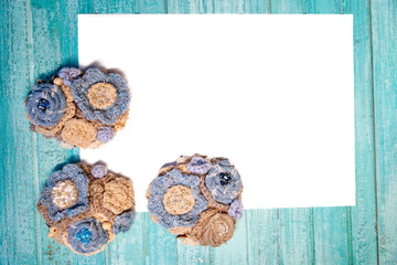 mockup blue fabric brooch with threads on table