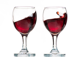 splash and flow from red wine in a glass, speed freeze