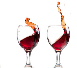 splash and flow from red wine in a glass, speed freeze
