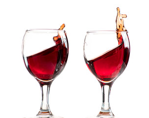 splash and flow from red wine in a glass, speed freeze
