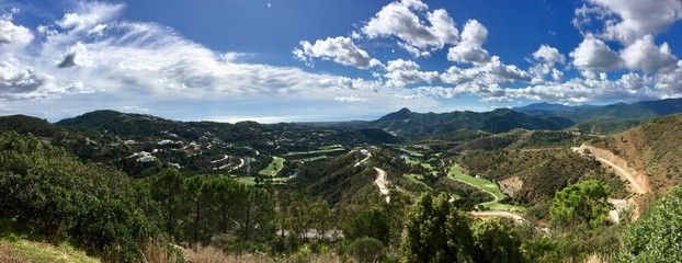 Fototapeta na wymiar Beautiful view on sunny day;Valley between Spanish mountains