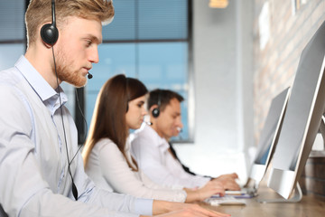 Technical support team working in modern office