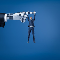 Tiny businessman hanging on robotic finger on blue background