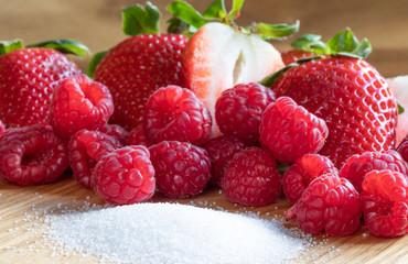Strawberry. Raspberry. Fruits. Raw. Sugar. Macro. Red