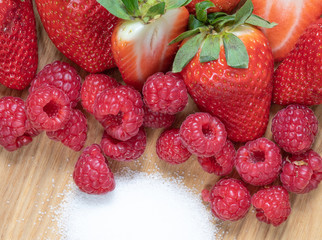 Strawberry. Raspberry. Fruits. Sugar. Macro. Raw. Red
