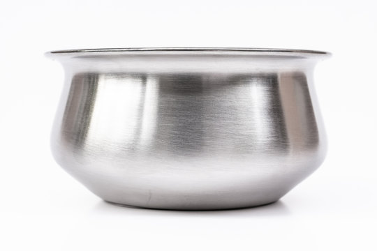 Stainless steel bowl on white background. side view