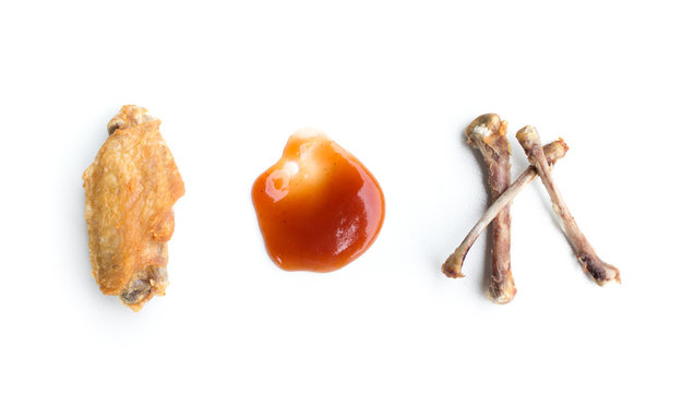 Fried chicken wings and chicken bone isolated on white background