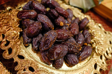 Dried medjool dates full-frame close-up flat lay.