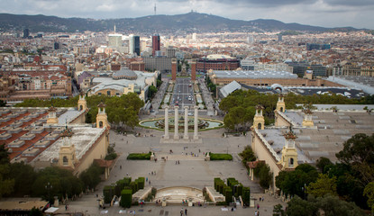Barcelona panorama with mountains in background and square with columns in foreground
