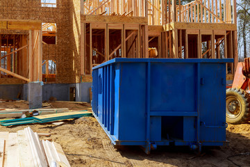 Old and used construction material in the new building construction work site.