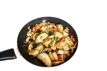 fried potatoes in a pan on a white background