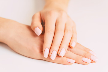 Young female hands with stylish manicure.