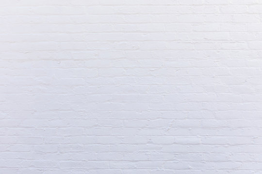white painted vintage old brick wall © travelview