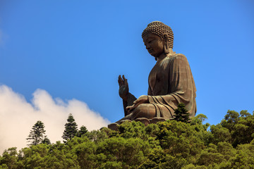 Fototapeta premium Photograph of Tian Tan Buddha, Big Buddha Statue of Buddha Shakyamuni - World's tallest outdoor seated bronze Buddha located in Ngong Ping, Lantau Island Hong Kong.