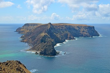 Fantastic view of a rocky uninhabited island Ilheu da Cal from Ponta da Calheta, Porto Santo,...