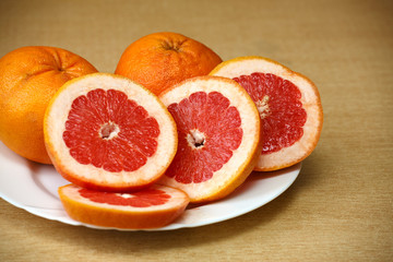 Naklejka na ściany i meble grapefruit on a plate