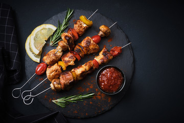 Shish kebab with mushrooms, cherry tomato and sweet pepper, Grilled meat skewers - obrazy, fototapety, plakaty