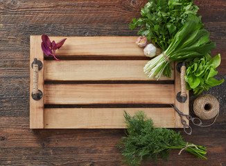 Herb leafs on wood tray