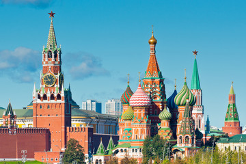Fototapeta premium Spasskaya Tower and Cathedral of Vasily the Blessed (Saint Basil's Cathedral) on Red Square. Moscow. Russia