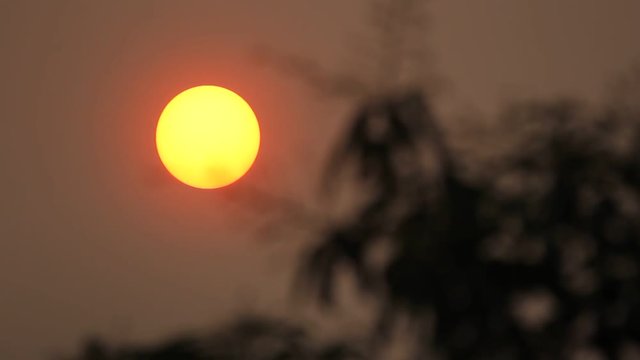 Sun in Smoke and Pollution Haze of Chiangmai sky