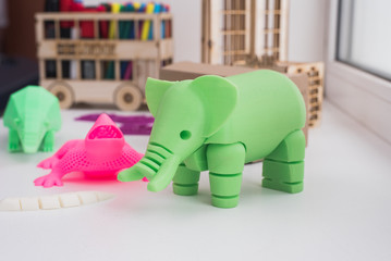 3D figures printed on an elephant, lizard, and snail printer. 3d toys for children