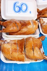 Boiled chicken with fish sauce in market
