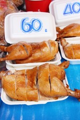 Boiled chicken with fish sauce in market