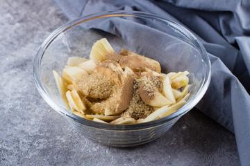 Recipe Step by step. Homemade pies with apples and almond flakes. Sliced apple, sugar and cinnamon