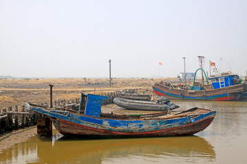 Fototapeta na wymiar Wooden fishing boats on the shore