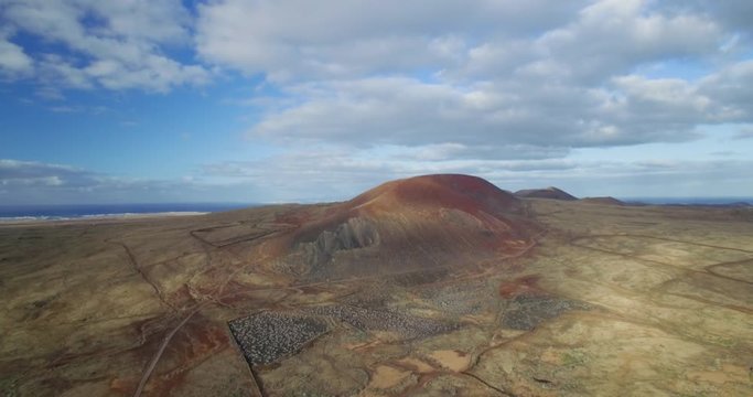 Aerial drone shot of volcanic mountain in Fuerteventura.