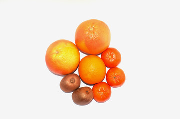 Fruit kiwi, mandarin, orange and grapefruit on a white background