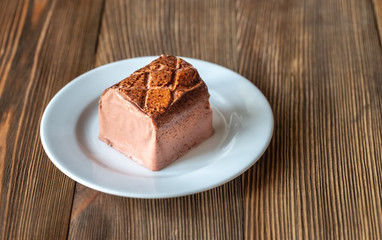 Chicken liver pate on the white plate