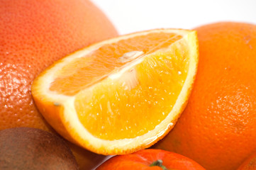 Slice of juicy delicious orange close up, copy space